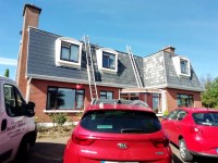 During roof painting of a dormer bungalow by Pro Wash, Cork, Ireland