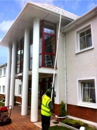 Gutter cleaning using advanced long pole technology with soft washing gentle cleaning action -   by  Pro Wash.ie, Cork, Ireland