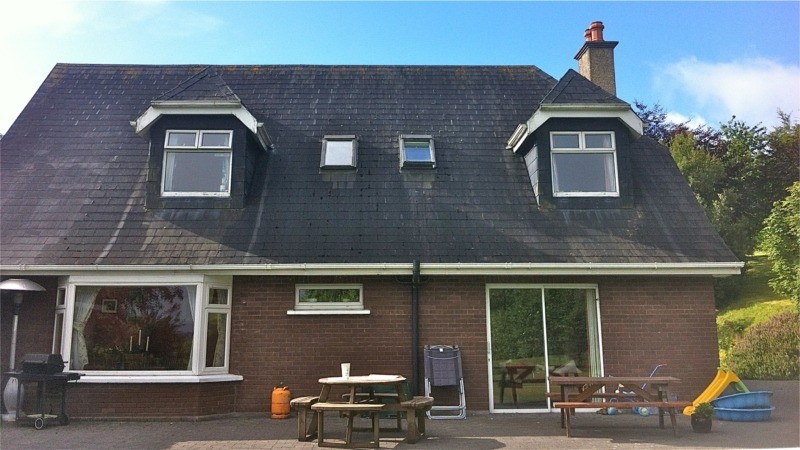 Before treatment and painting of a slate roof of a house in Cork by Pro wash