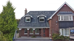 Before  treatment and painting of a slate roof of a house in Cork by Pro wash