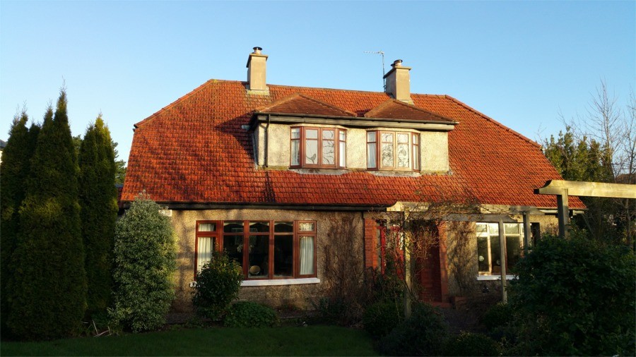 Before and after cleaning of the roof of a Cork house by Pro Wash, Ireland