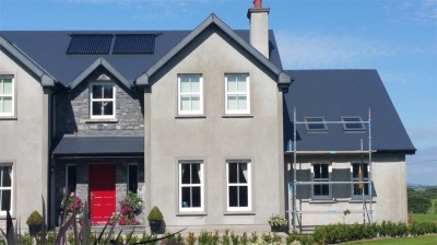After treatment and painting of the roof of a two-storey house in Cork by Pro Wash